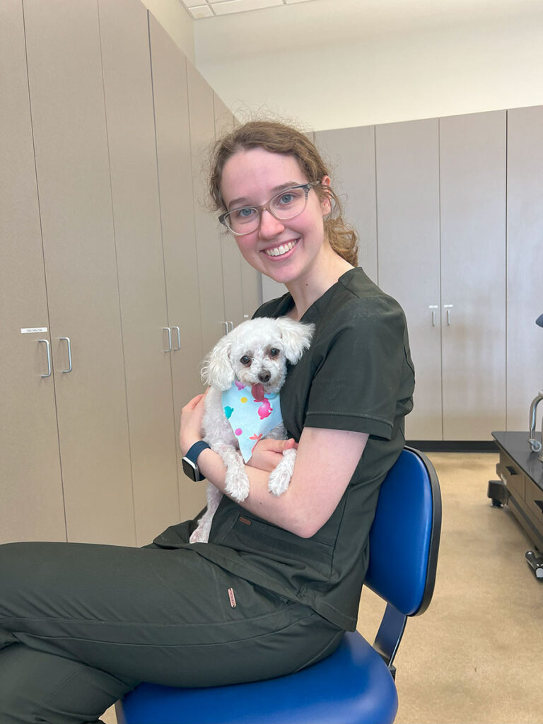 Sophia with a dog, post-groom